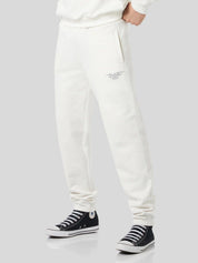 White pants with embroidered logo