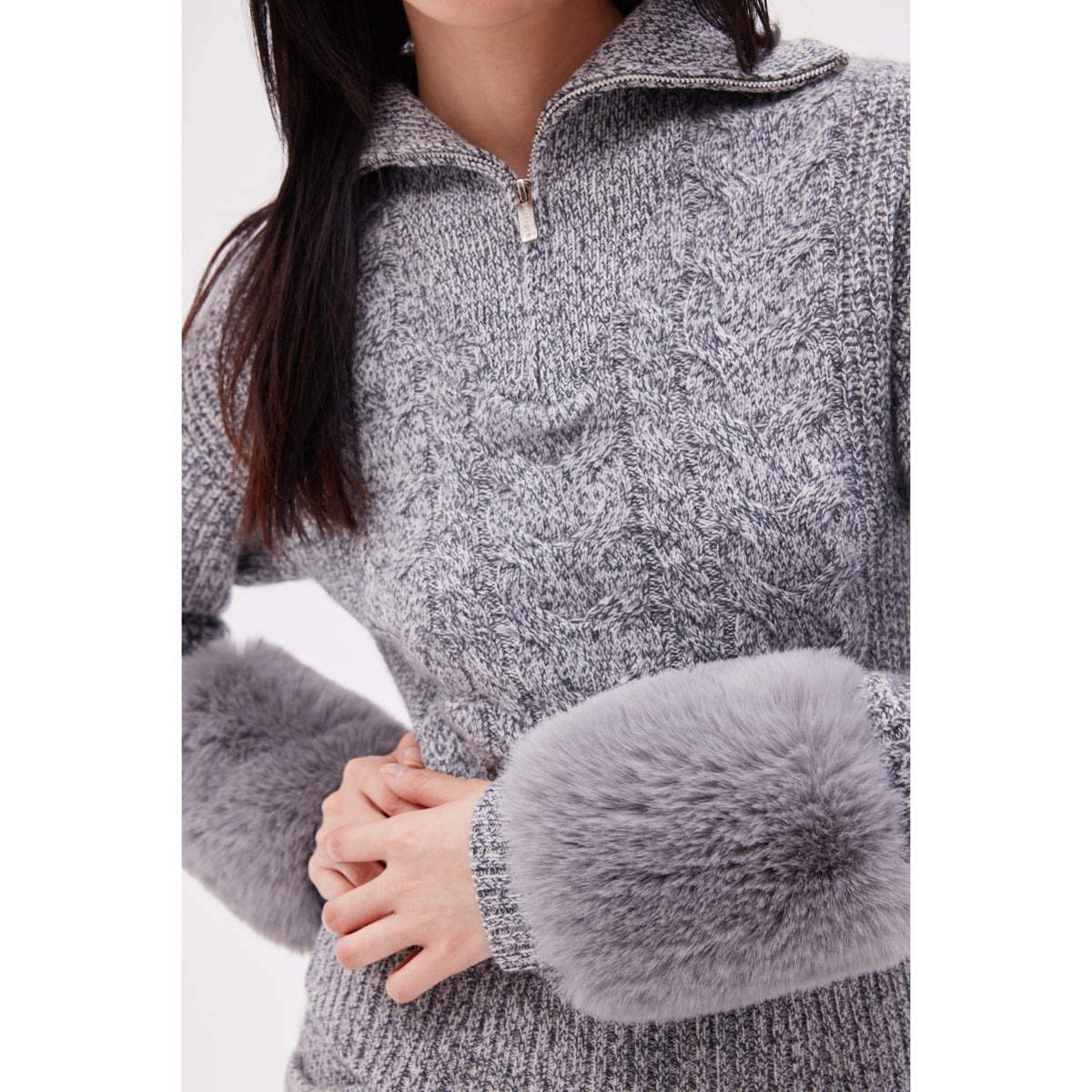 The zip up pullover with faux fur cuffs in ink
