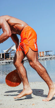 Orange swim shorts