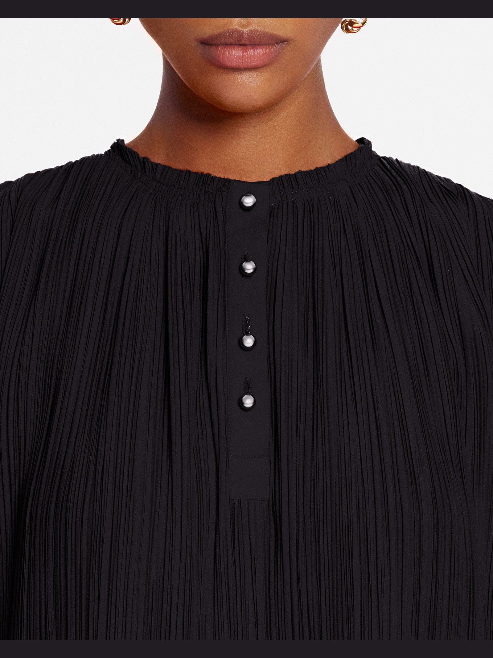 Sleeveless pleated top