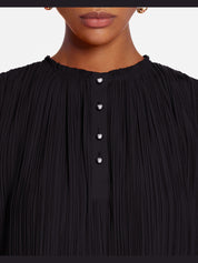 Sleeveless pleated top