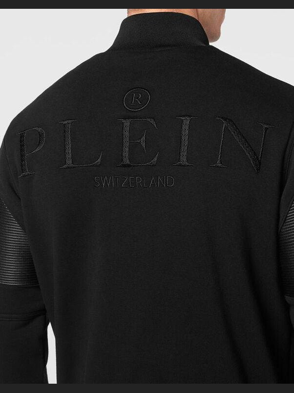 Jogging tracksuit: top/trousers constructed