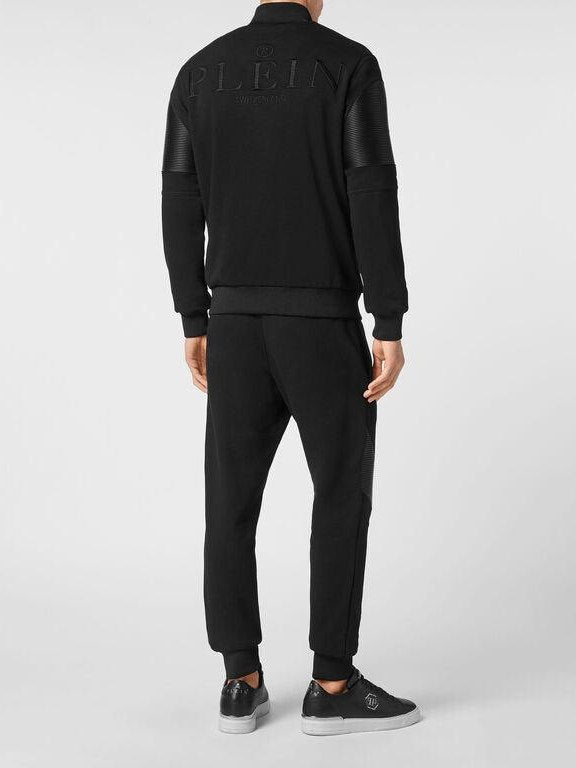 Jogging tracksuit: top/trousers constructed