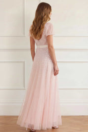 Sequin cascade bow short sleeve gown