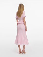 Pink pointelle peplum knit midi dress