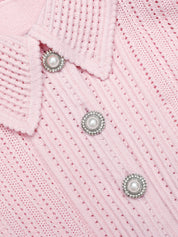 Pink pointelle peplum knit midi dress