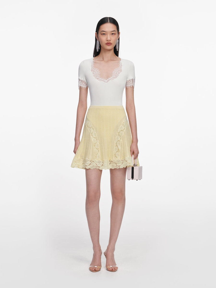Yellow pointelle knit mini skirt