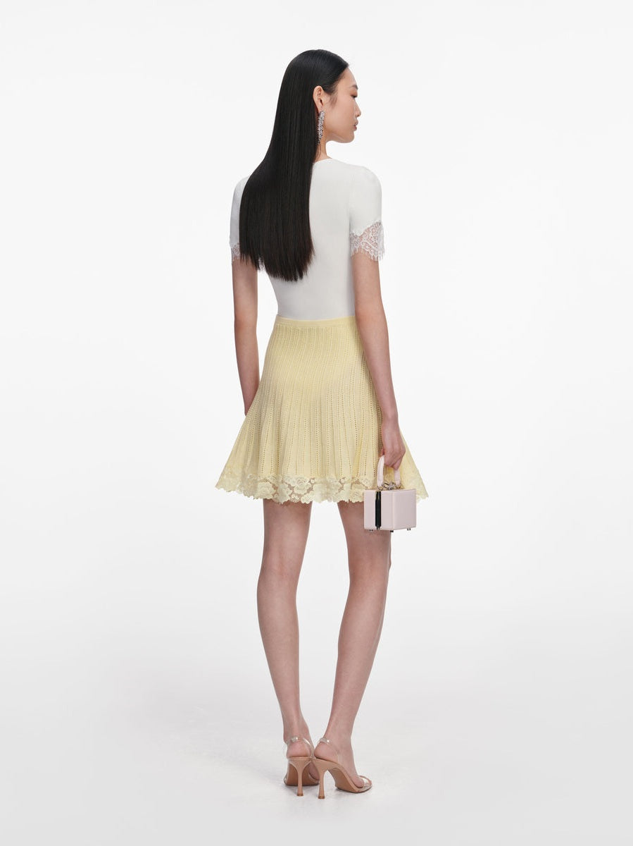 Yellow pointelle knit mini skirt