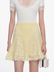 Yellow pointelle knit mini skirt