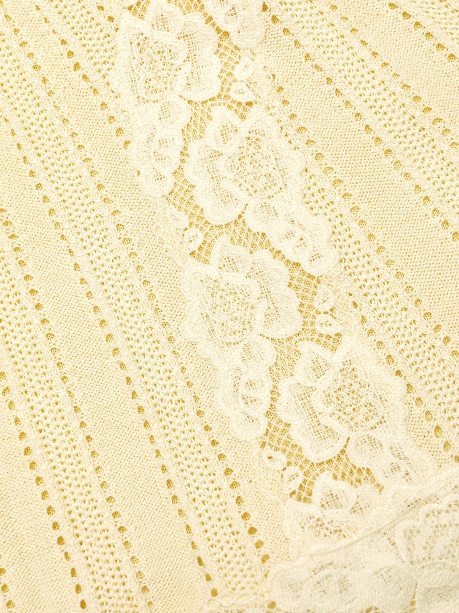 Yellow pointelle knit mini skirt