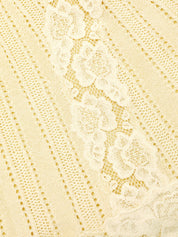 Yellow pointelle knit mini skirt