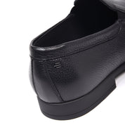 Black tumbled leather slip-on shoe