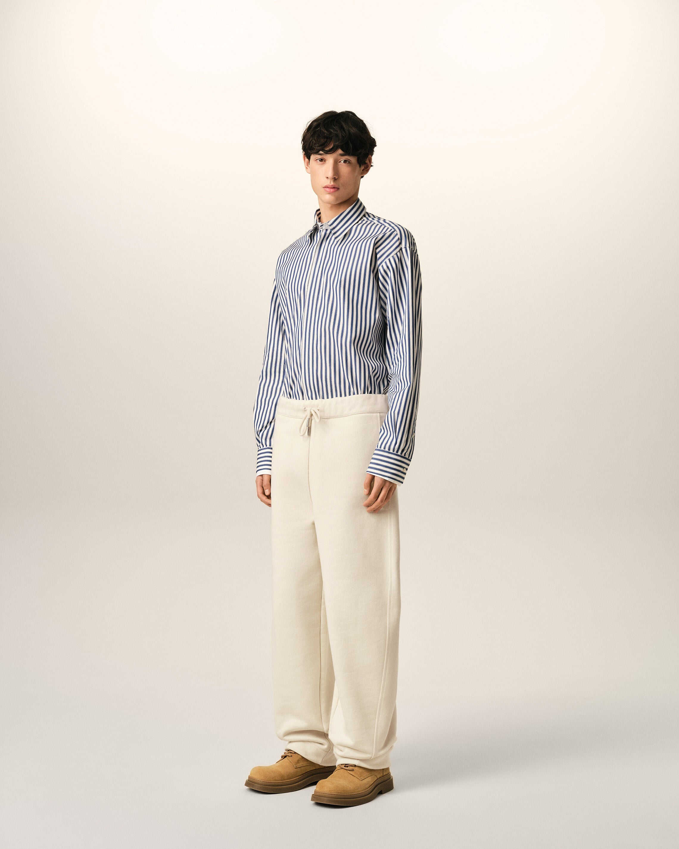 White cotton track pants with heritage Ami Paris label