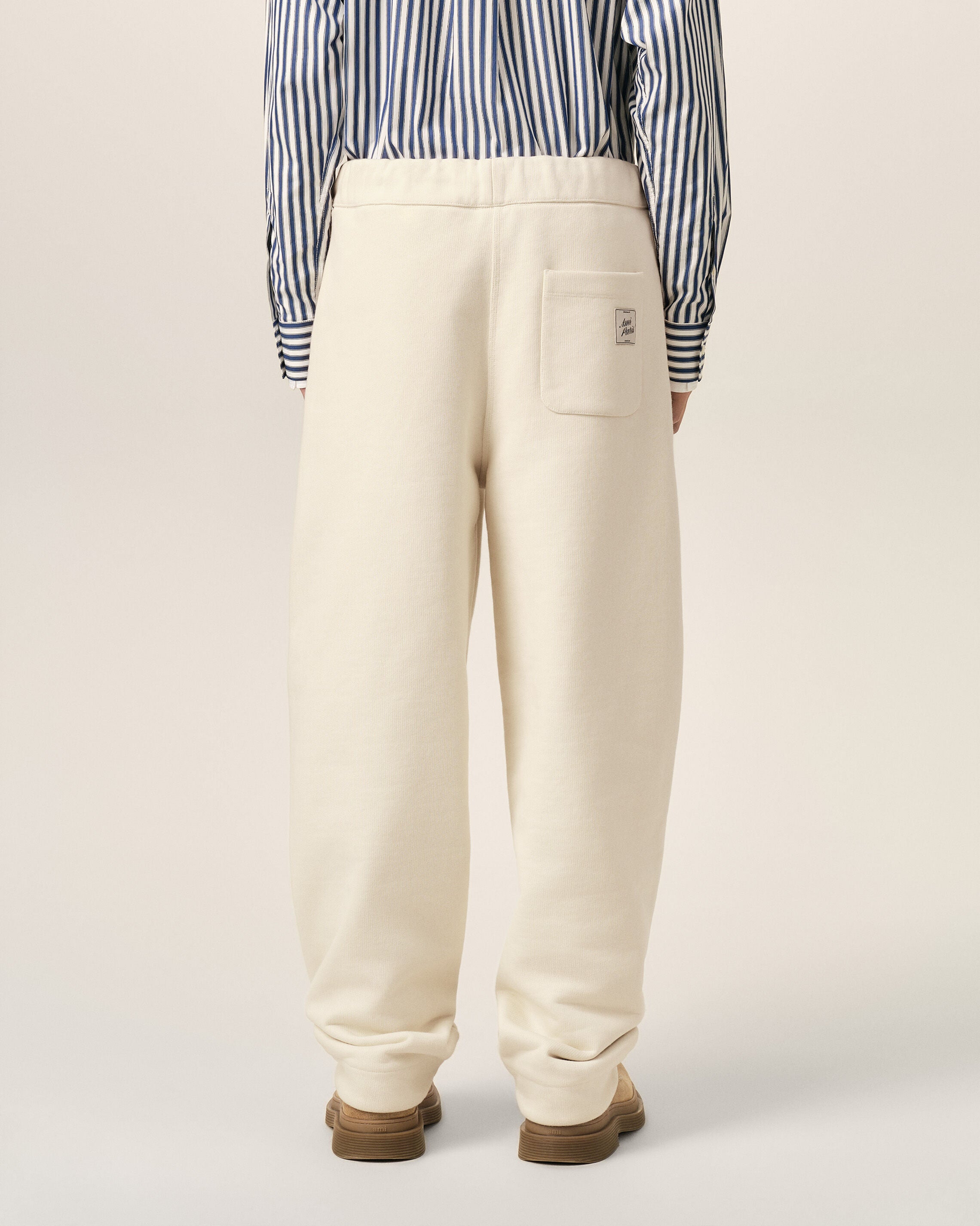 White cotton track pants with heritage Ami Paris label