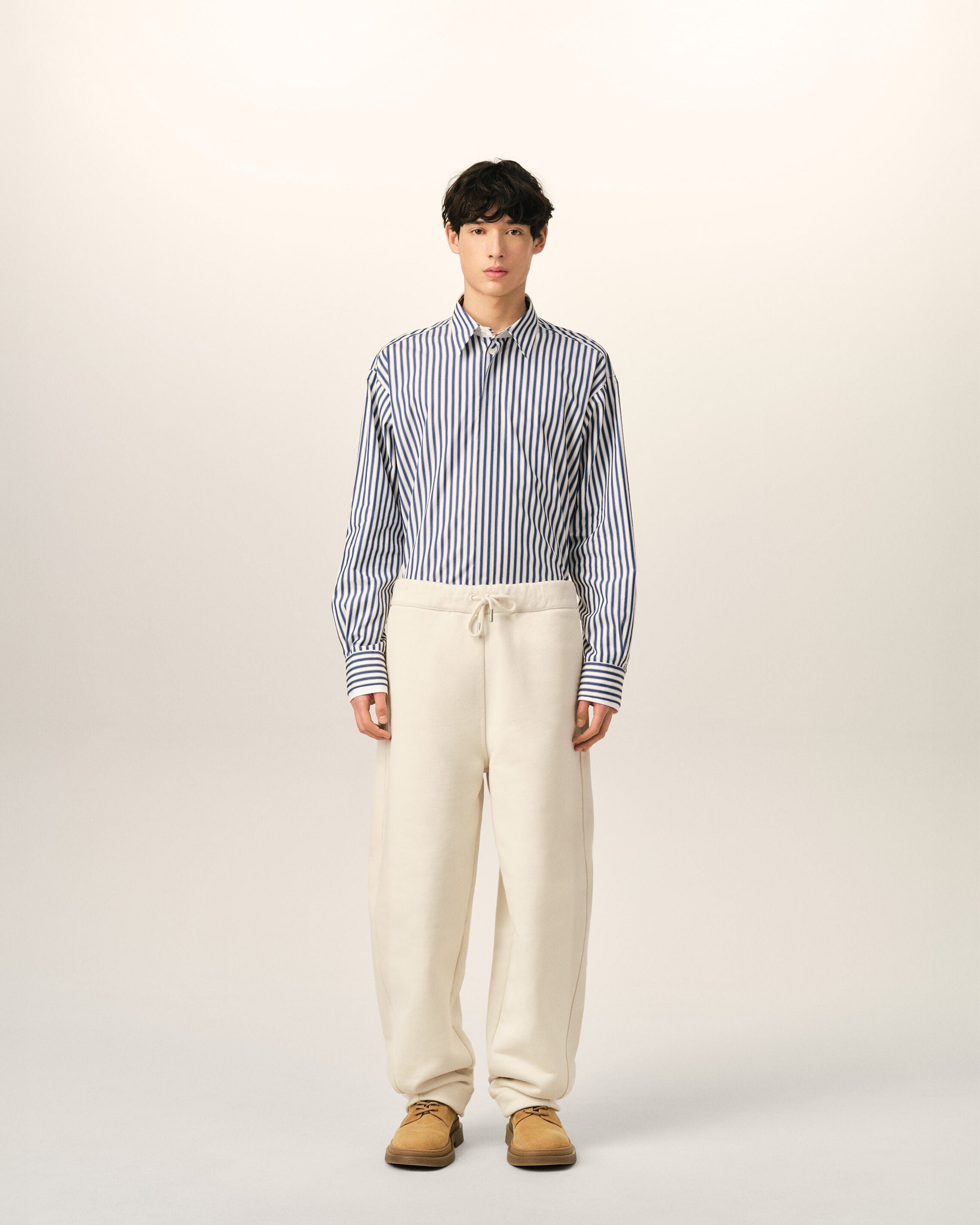 White cotton track pants with heritage Ami Paris label