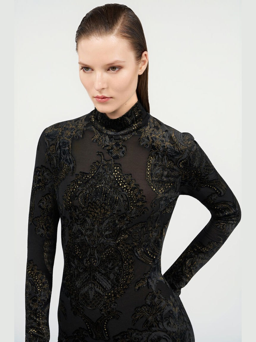 Dress with ornamental black print