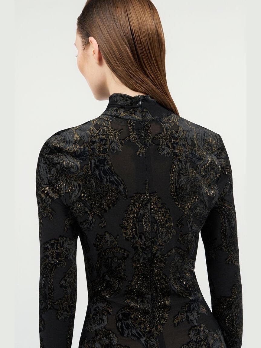 Dress with ornamental black print