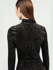 Dress with ornamental black print