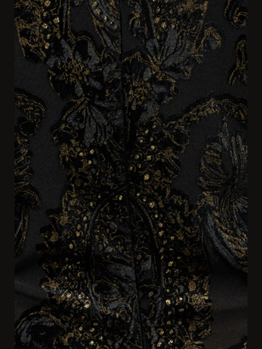 Dress with ornamental black print