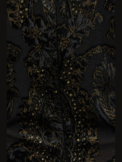 Dress with ornamental black print