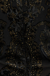 Dress with ornamental black print