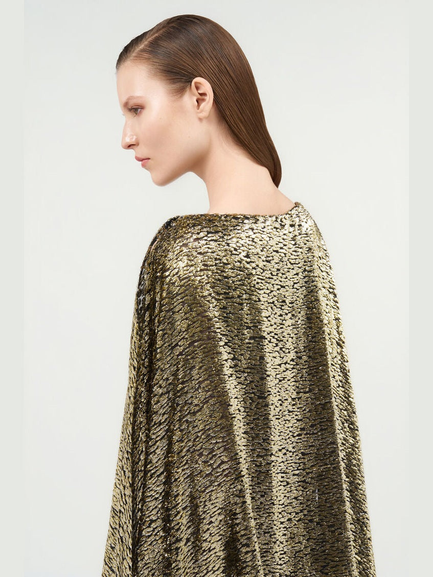 Asymmetric gold lamé dress