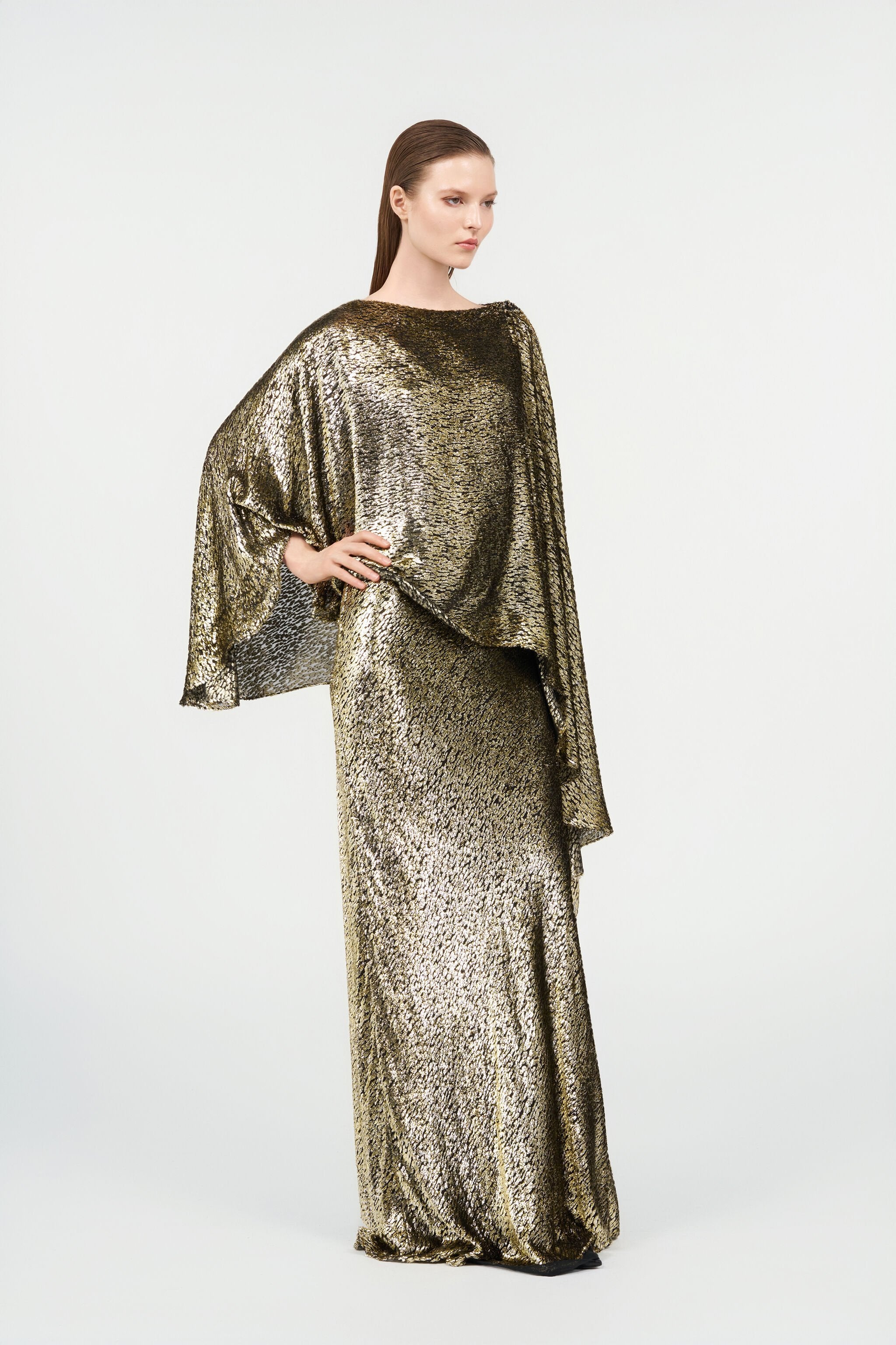 Asymmetric gold lamé dress