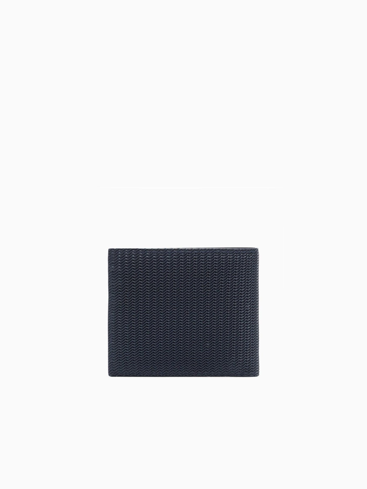 Bifold wallet in embossed leather