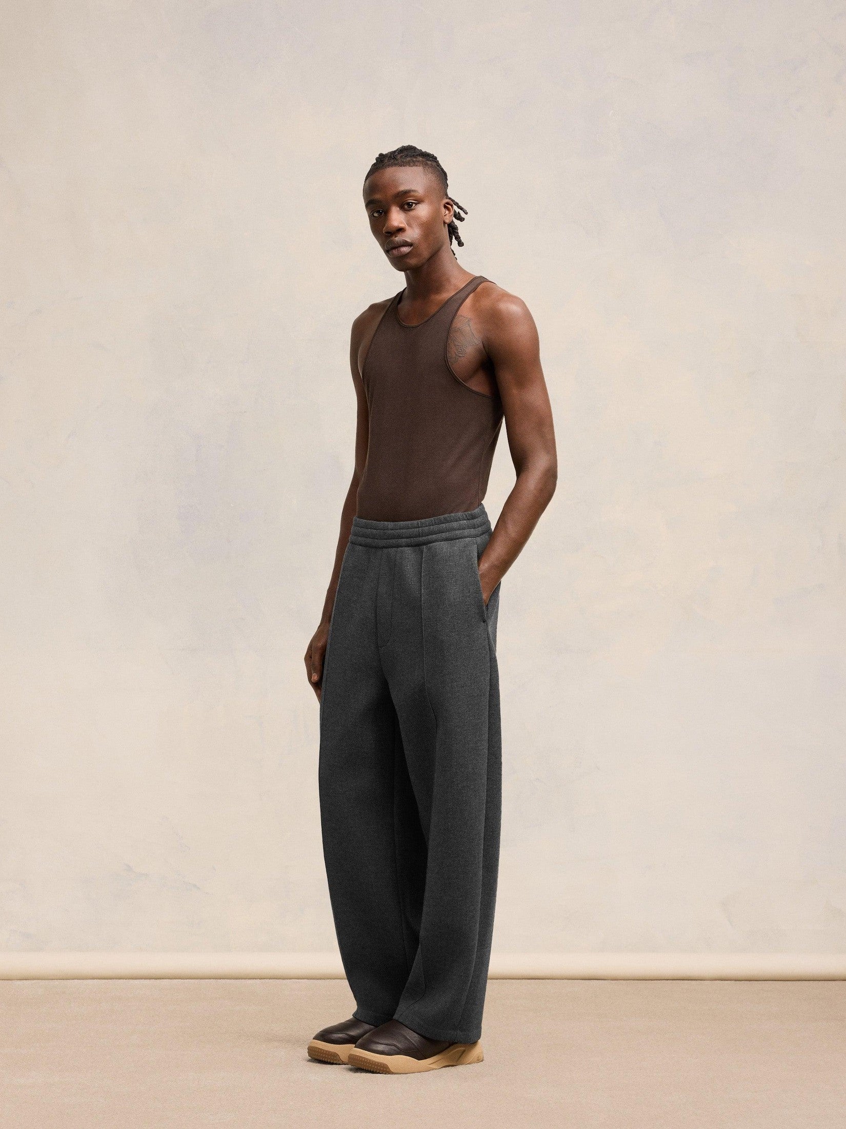 Ami pleated trousers pleated trousers in bonded wool viscose canvas.