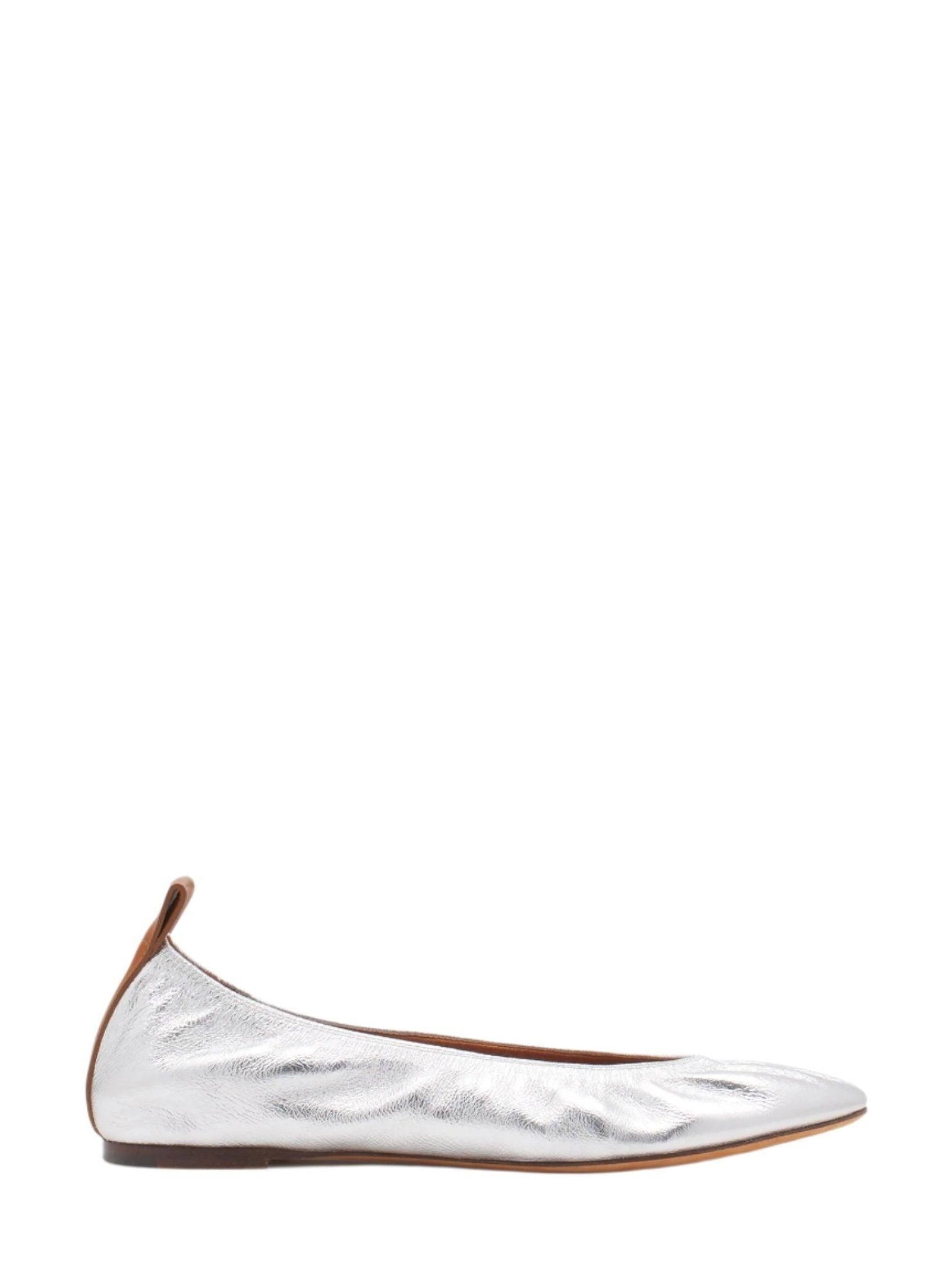 The ballerina flat in metallic leather