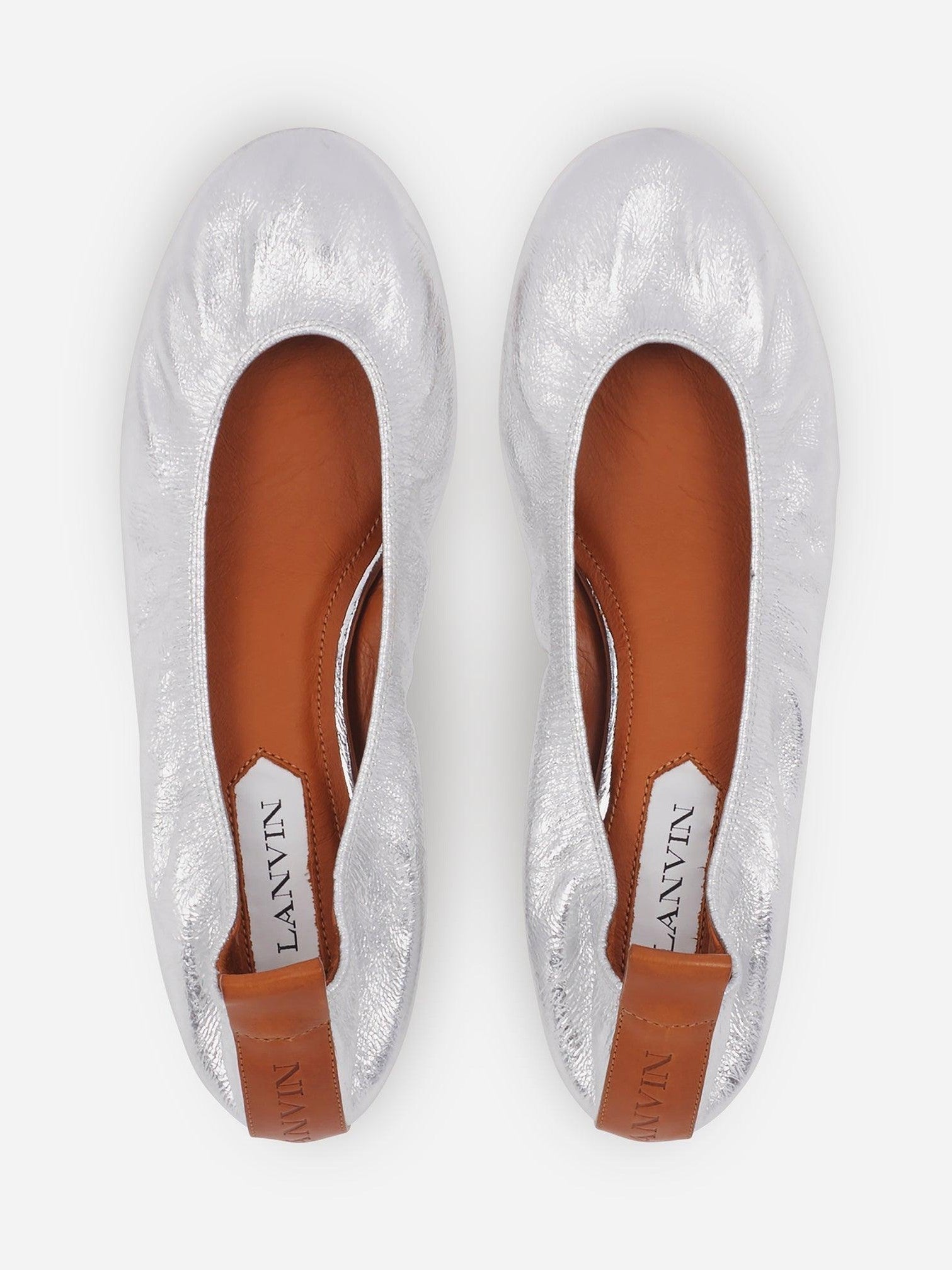 The ballerina flat in metallic leather